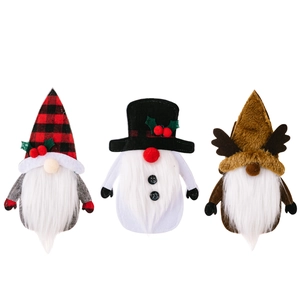 Three Christmas gnome cutlery holders featuring snowman and reindeer holiday designs