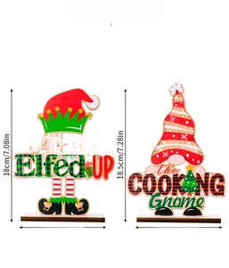 Detailed view of wooden Christmas gnomes figurines with Let's Get Elfed Up and Cooking Gnome text