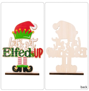 Front and back detail of a wooden Christmas gnome ornament with festive lettering