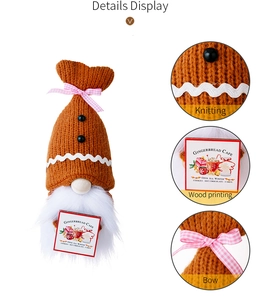 Detail of Christmas gnome showing knitted hat texture and gingerbread cafe sign
