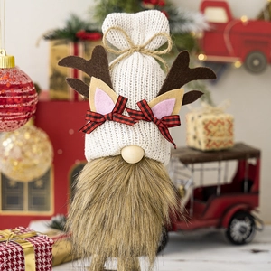 Detail of Christmas reindeer gnome featuring a knitted hat and soft faux fur beard
