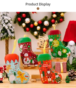 Tinplate Christmas stocking gift boxes with festive patterns and golden hanging ropes