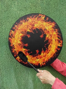 Close-up of Shaman drum with flame pattern including a matching black mallet