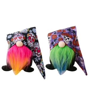 Pair of Day of the Dead gnome ornaments with skull print hats and colorful fiber beards