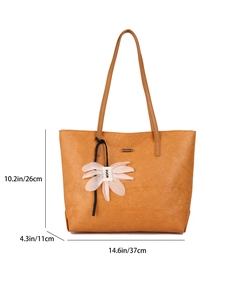 Brown faux leather tote bag with long straps and floral charm, size 37x26x11cm