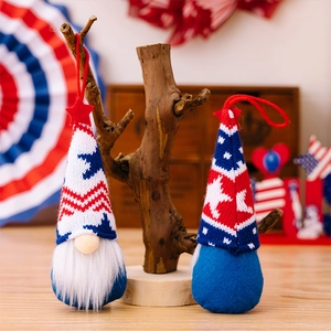 Detail of handmade patriotic July 4th gnomes with star patterns and red white blue colors