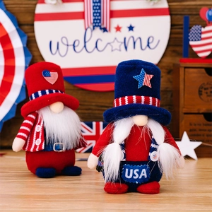Close-up of patriotic gnome plush set with USA flag patterns on rustic wooden tabletop