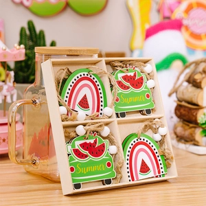 Close-up of watermelon wooden ornaments with ropes and white beads in a 4-grid storage box