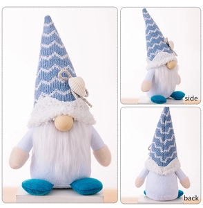 Detailed front, side and back views of a knitted ocean gnome with shell decorations