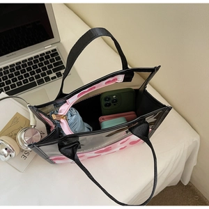 Top view of a heart print PVC tote showing large capacity for daily essentials