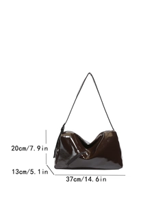 Brown glossy patent leather handbag with 20cm height and 37cm length dimensions