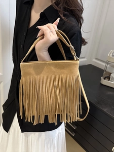 Khaki suede tassel handbag with fringe detail and adjustable strap for women