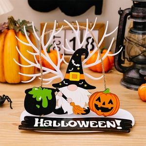 Halloween jewelry tree with gnome, cauldron, and pumpkin ornaments on a festive display