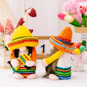 Detail of two Mexican carnival gnomes with colorful stripes, sombrero, and mini guitar
