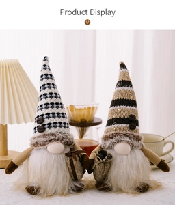 Close-up of lighted coffee gnomes with knitted hats and coffee bean details