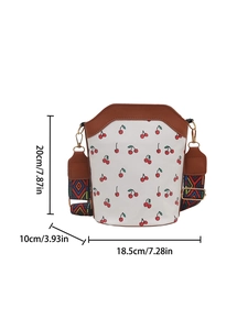 Vertical bucket bag with cherry print and geometric woven strap, shown in size dimensions