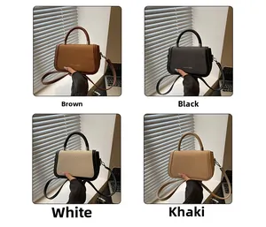 Vue détaillée de sacs à main carrés en cuir texturé marron, noir, blanc et kaki de mode