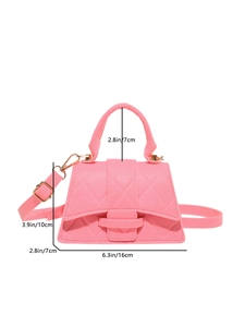 Pink quilted trapezoid handbag with gold hardware and removable shoulder strap
