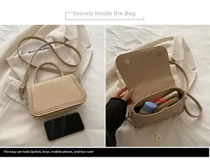 Détail du sac à bandoulière beige montrant la capacité intérieure et la taille avec téléphone