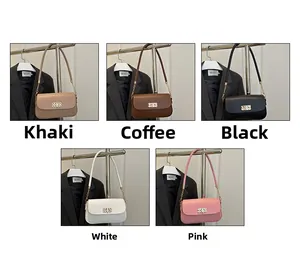 Five assorted colors of elegant flap crossbody bags hanging on metal racks in indoor setting