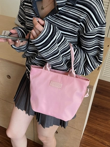 Chic pink nylon tote bag for women with FASHION leather patch and top zip closure