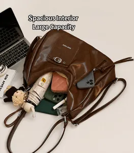 Detailed interior view of a large brown tote bag showing its spacious storage capacity