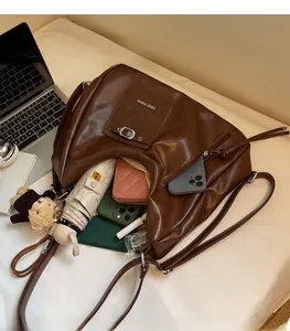 Detailed interior view of a large brown tote bag showing its spacious storage capacity