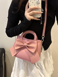 Pink fashion handbag with oversized bow detail, mini top handle crossbody bag for women