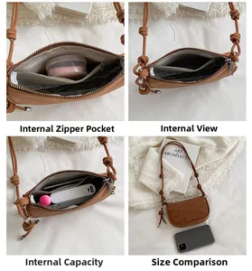 Detailed view of the brown retro crossbody bag interior and drawstring strap texture