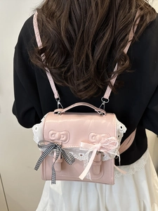 Pink lace bow mini backpack for women featuring cute lolita style and leather texture