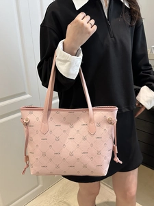 Pink lychee grain leather tote bag with rabbit print and side tassel decoration
