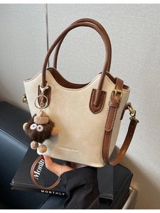 Borsa a Secchiello in Pelle PU Vintage da Donna Colore a Contrasto Tracolla Con Portachiavi Mostro in Peluche