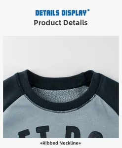 Close-up of kids sweatshirt featuring a black ribbed neckline and soft grey cotton fabric