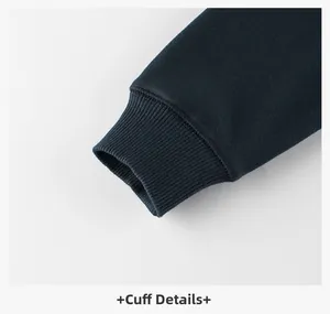 Detail of ribbed knit cuffs on kids navy pullover sweatshirt showing fabric texture