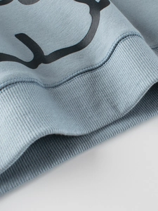 Kids grey-blue crewneck sweatshirt featuring ribbed hem detail and black graphic print