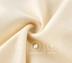 Gros plan sur maille crème douce, texture respirante conforme aux normes de sécurité A