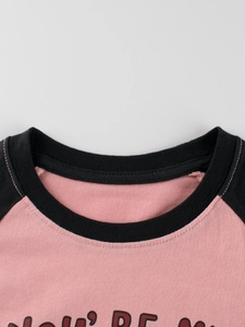 Girl's pink and black raglan sleeve t-shirt with crew neck and letter print detail