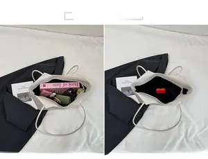 Internal view of a spacious woven tote bag showing storage for daily essentials