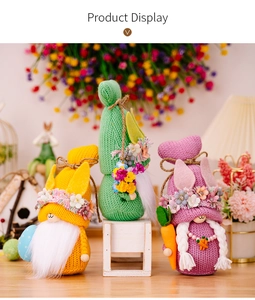 Detailed display of three handmade Easter gnomes with knit textures and spring flower accents