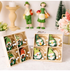Detail of St. Patrick's Day wooden gnome ornaments with lucky clovers and jute twine