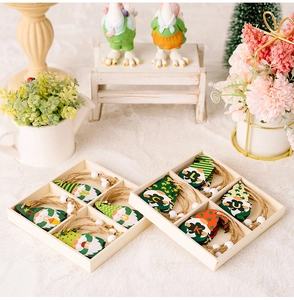 Detailed view of St. Patrick's Day wooden gnome ornaments in a rustic storage box