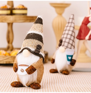 Detail of two coffee-themed gnomes with burlap bodies and knitted hats for home decor