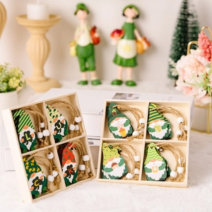 St. Patrick's Day wooden gnome ornaments set with Luck letters and green leaf design