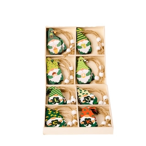 8-piece St. Patrick's Day wooden gnome ornaments set with LUCK letters and clover patterns