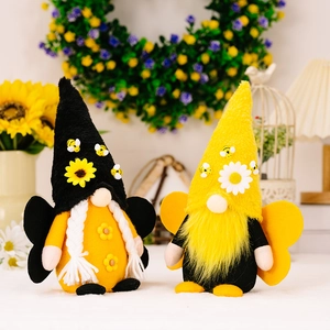 Handmade bee gnomes with wings and sunflowers for spring home decor and garden ornaments