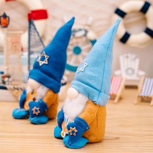 Detailed view of Hanukkah Gnomes with Star of David hats and Menorah card decor
