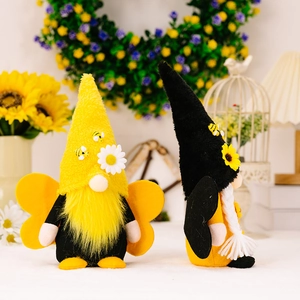Set of two yellow and black bee gnomes with sunflowers and daisies for spring home decor
