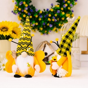 Pair of bumble bee gnome plush dolls with striped hats and sunflower decor for home