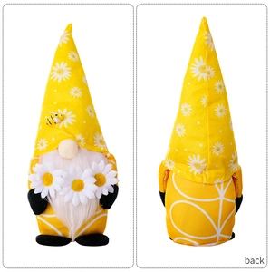 Front and back detail of a yellow sunflower bee gnome plush with a daisy pattern hat