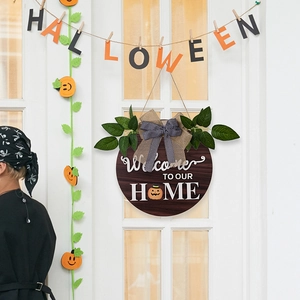 Halloween Welcome To Our Home wooden door sign with pumpkin icon and plaid bow